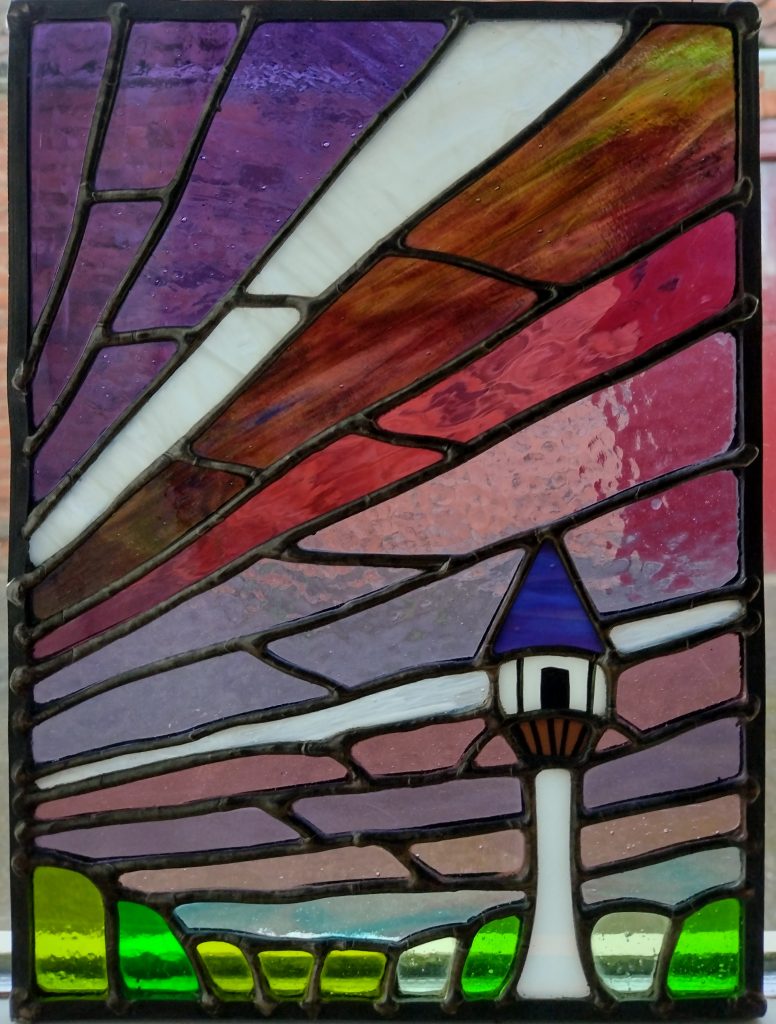 Rapunzel style tower with a purple sky stained glass panel